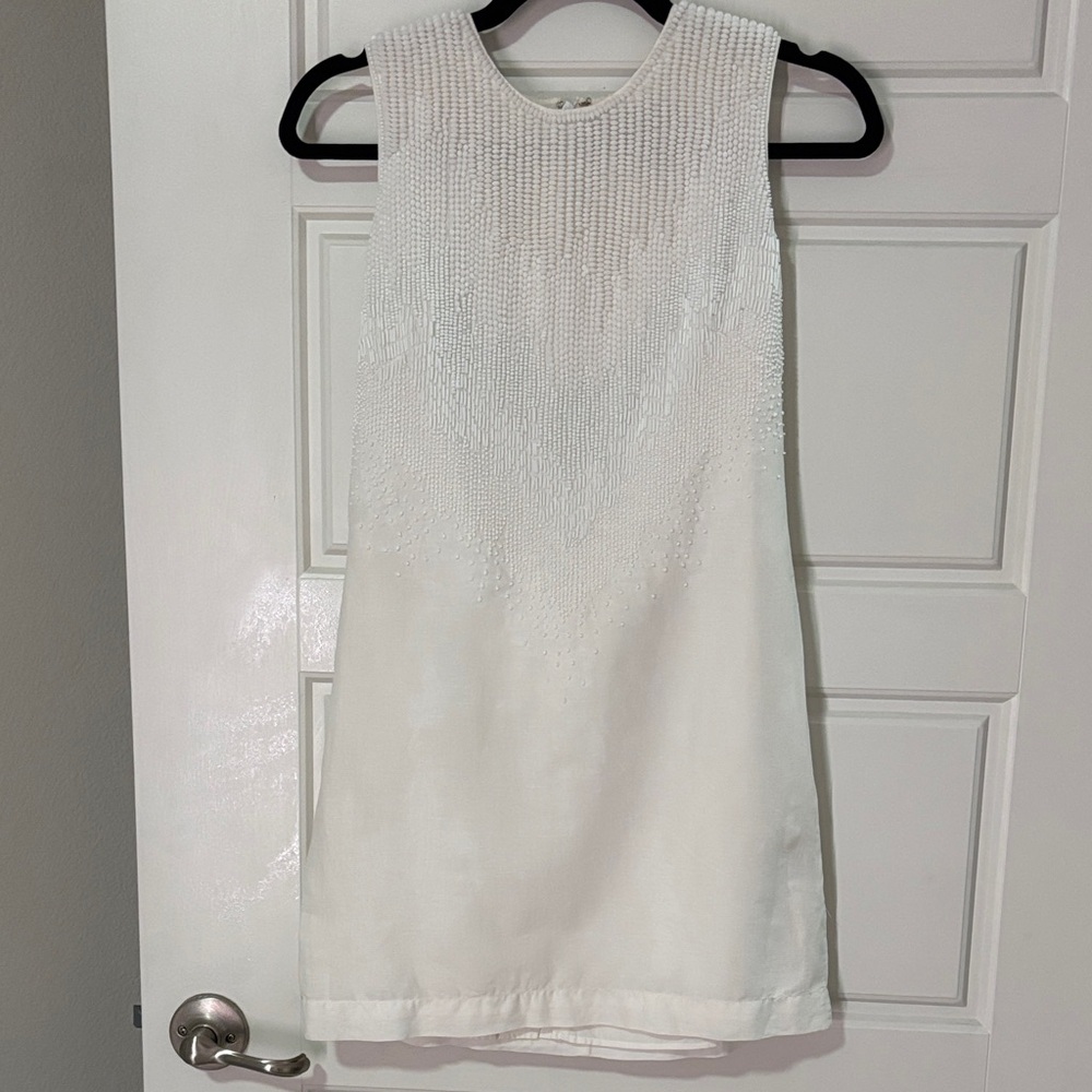 Elegant White Beaded Sleeveless Dress